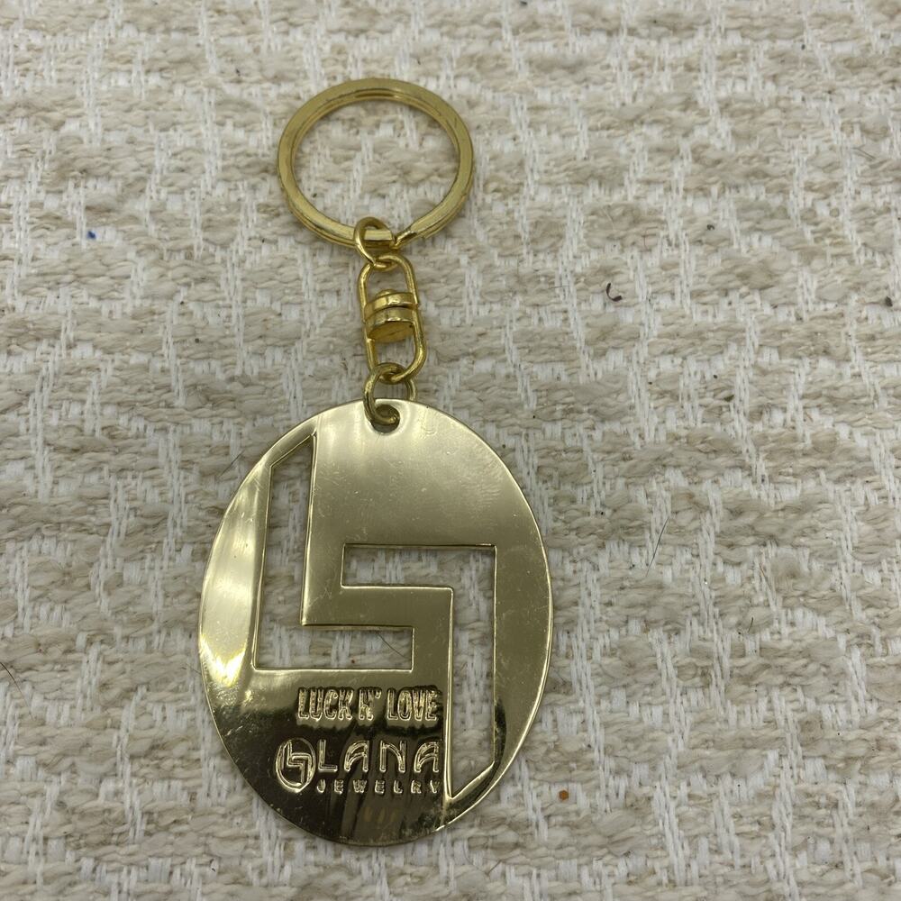 Lana jewelry metal designer keyring with charm.